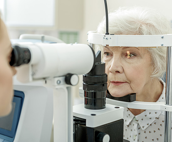old woman taking eye care at Levin Eyecare